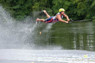 GB's Tom Heaps jumping to gold at the Europe & Africa Barefoot Waterski Championships in France on 30 July 2022