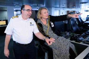 EDITORIAL USE ONLY (R-L) Lord Mayor Clr. Sue Dann discusses the equipment on the Bridge of the Rotterdam with the Master of the Ship, Werner Timmers during a visit of the Holland America Line’s Rotterdam VII passing through Plymouth as part of its 150th Anniversary Transatlantic Crossing. Picture date: Tuesday October 18, 2022. PA Photo. The 15-day journey, that departed Rotterdam on Saturday, recreates Holland America Line’s maiden voyage of Rotterdam I. The crossing follows the path of that first sailing 150 years ago on the same departure day from Rotterdam to New York, with calls at Le Havre in France as well as Plymouth.