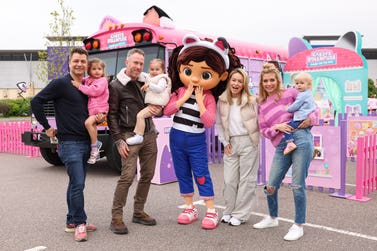 EDITORIAL USE ONLY Rachel Riley, Pasha Kovalev, James and Ola Jordan with their children Maven, Noah and Ella attend the opening of ÔGabby on the Go!Õ, the Interactive fan experience based around DreamWorks AnimationÕs TV series GabbyÕs Dollhouse, at Lakeside Retail Park, London. Picture date: Saturday May 13, 2023. PA Photo. The experience includes a variety of free activities includingÊ picture opportunities in a hot air balloon and the SS Mercat, dancing in DJ CatnipÕs Music Bus, and an immersive revolving block game. The experience will tourÊ varying cities throughout May and June including Cardiff, Manchester, Sheffield, Glasgow, and Newcastle.