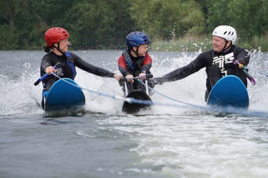 Assisting a disabled water skier at The Edge Adaptive Sports Centre in Staines, Surrey. The charity, Access Adventures, is crowdfunding to upgrade changing facilities at the centre.