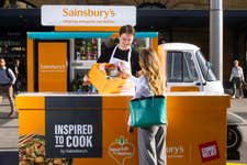 EDITORIAL USE ONLY Sainsbury's ‘DINspiration’ pop-up at London’s Kings Cross station has been launched to support its community programme, Nourish the Nation, with Comic Relief. Picture date: Monday 26, 2023. PA Photo. Targeting commuters with the pop-up, the supermarket will donate 50p for every ‘Inspired to Cook’ product sold until July 11th. The activation follows research that found 6 in 10 British people admitted they struggle to come up with healthy meal options for dinner, citing lack of inspiration as the key reason for this.