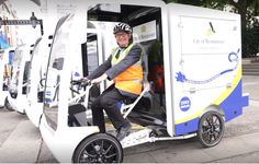 Cllr Paul Dimoldenberg launching new Veolia EV bikes