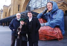 *** FREE FOR EDITORIAL USE *** Crisis CEO Matt Downie MBE with ambassadors and award winning actors Imelda Staunton and Jonathan Pryce unveils a giant, hyper-real sculpture of a person experiencing homelessness at London King’s Cross station, with the powerful protest coming after new research revealed 300,000 households could be left homeless next year