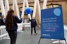 EDITORIAL USE ONLY Diabetes duo Anita and Georgia from London, set the Guinness World Record for keeping a balloon in the air at Kings Cross station this weekend in celebration of World Diabetes Day and theÊ#BlueBalloonChallenge - an online challenge currently raising funds for diabetes charity, Life for a Child. .