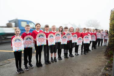 EDITORIAL USE ONLY Eighteen children from Ravenfield Primary Academy, Rotherham, hold Road Safety Week banners representing the number of pedestrians and cyclists killed and seriously injured every week in Yorkshire and Humber region in 2021. Picture date: Monday November 14, 2022. PA Photo. The theme of Road Safety Week is Safe Roads for All. The Week is highlighting the vulnerability of people walking and cycling and the need for drivers to follow the Highway Code, particularly slow down and give space to vulnerable road users.