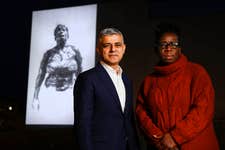 EDITORAL USE ONLY Rosamund Adoo-Kissi-Debrah and Mayor of London Sadiq Khan, in front a projection of ‘Breathe For Ella’, a new iteration of Dryden Goodwin’s artwork produced by art-science organisation Invisible Dust, which depicts Rosamund Adoo-Kissi-Debrah CBE, the mother of Ella Adoo-Kissi-Debrah, ‘fighting for breath’ at Rambert Building, in London. Picture date: Wednesday February 15, 2023. PA Photo. Ella died from a fatal asthma attack in 2013 and was the first person in the world to have 'air pollution' as a cause of death. The night projection, which is on display to the public until Saturday morning, commemorates the 10-year anniversary of her death and seeks to encourage support for ‘Ella’s Law’ (The Clean Air Bill).