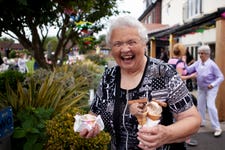 Marylin at Elmbridge Village, holding ice creams