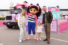 EDITORIAL USE ONLY James and Ola Jordan and their daughter Ella attend the opening of ÔGabby on the Go!Õ, the Interactive fan experience based around DreamWorks AnimationÕs TV series GabbyÕs Dollhouse, at Lakeside Retail Park, London. Picture date: Saturday May 13, 2023. PA Photo. The experience includes a variety of free activities includingÊ picture opportunities in a hot air balloon and the SS Mercat, dancing in DJ CatnipÕs Music Bus, and an immersive revolving block game. The experience will tourÊ varying cities throughout May and June including Cardiff, Manchester, Sheffield, Glasgow, and Newcastle.