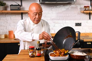 EDITORIAL USE ONLY Ken Hom cooks ‘Ken's Pork with Chu Hou Sauce’ from the new ‘Wok From Hom’ recipe series, a collaboration with Lee Kum Kee aiming to offer healthier, more affordable home-cooked alternatives to Chinese takeaways. Issue date: Thursday September 29, 2022. PA Photo. The launch of the series follows research by the brand which reveals almost 6 in 10 British people say they are cutting back on takeaways due to the cost of living. A full list of ingredients and step by step methodology for each recipe can be found on the Lee Kum Kee website from today.